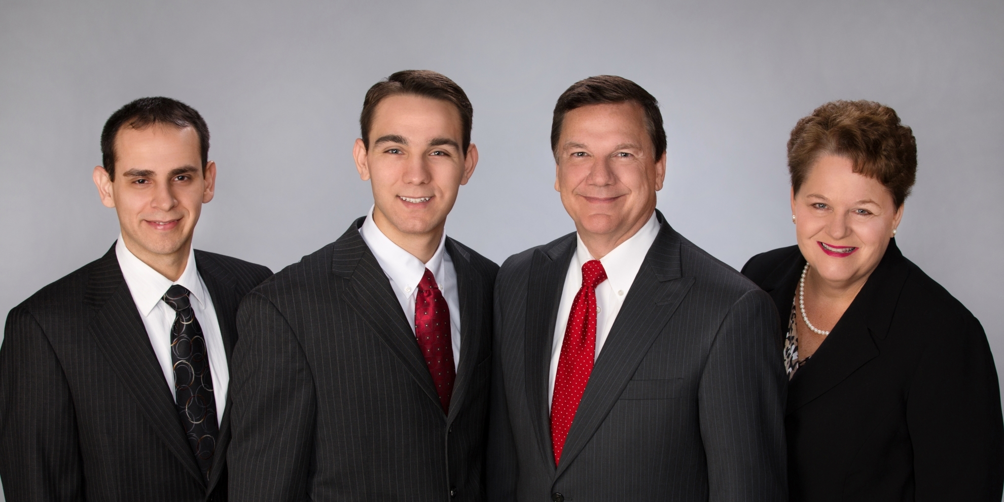 Ruder Group of Stifel group photo - left to right: Robert Kozsan, Bryan Ruder, Thomas Ruder, and Sharon Ruder