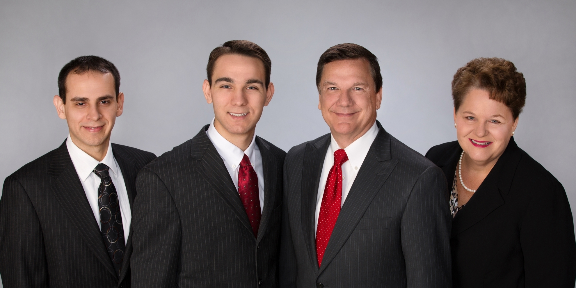 Ruder Group of Stifel group photo - left to right: Robert Kozsan, Bryan Ruder, Thomas Ruder, and Sharon Ruder